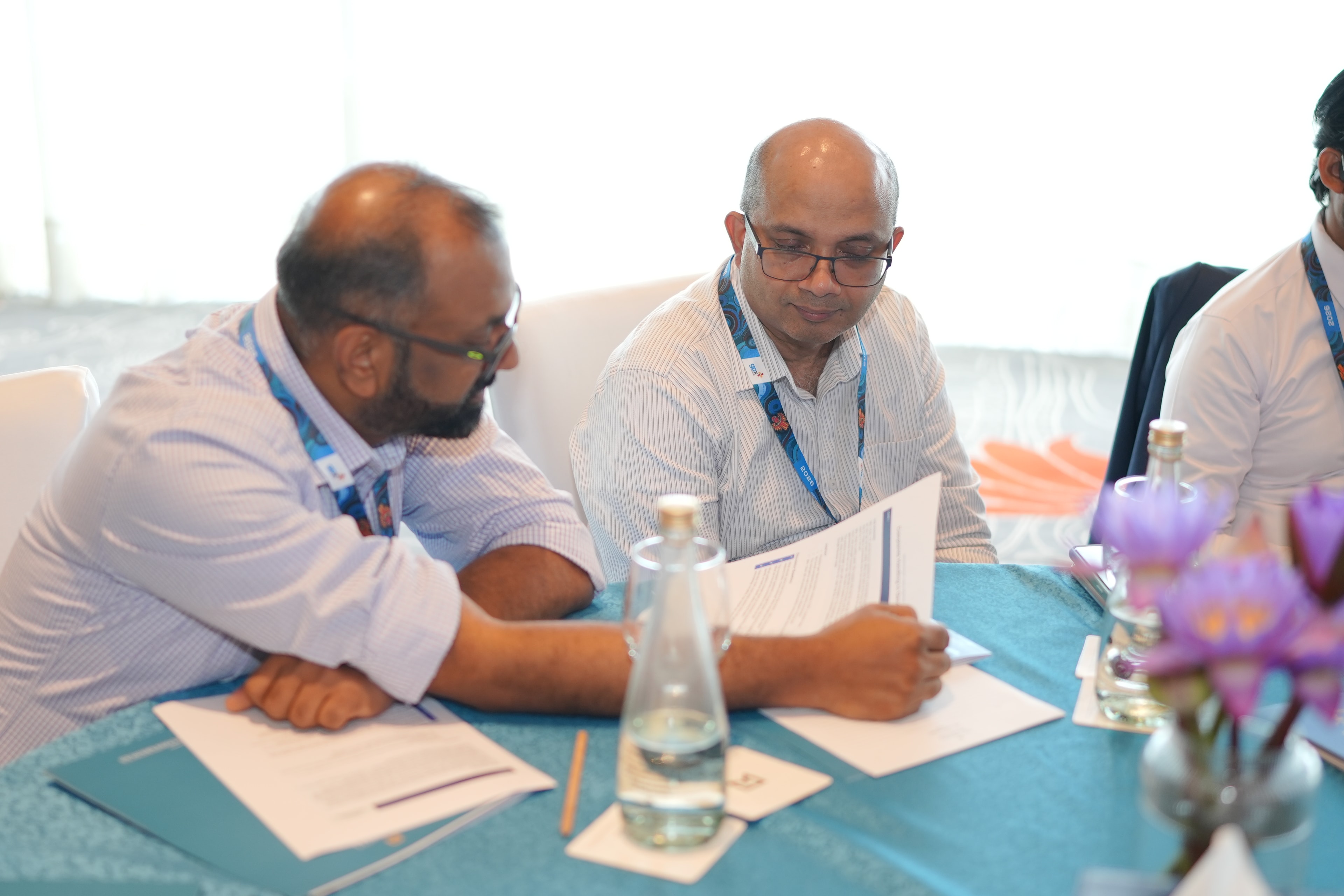 gpx 2026 delegates reviewing conference materials at their table during an education session in Colombo, Sri Lanka